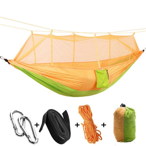 yellow green camping hammock with mosquito net