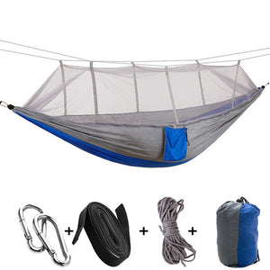 grey blue camping hammock with mosquito net